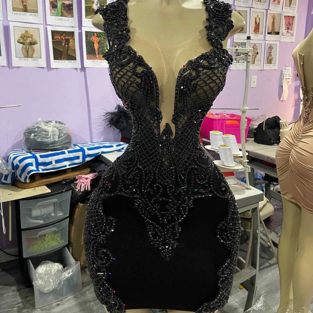 Medium black sequins birthday dress. Worn for pictures!